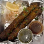 Seekh Kabab w/ Yellow Rice & Salad